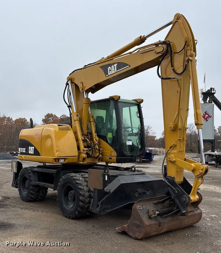 image for item DW7310 2005 Caterpillar M313C wheeled excavator