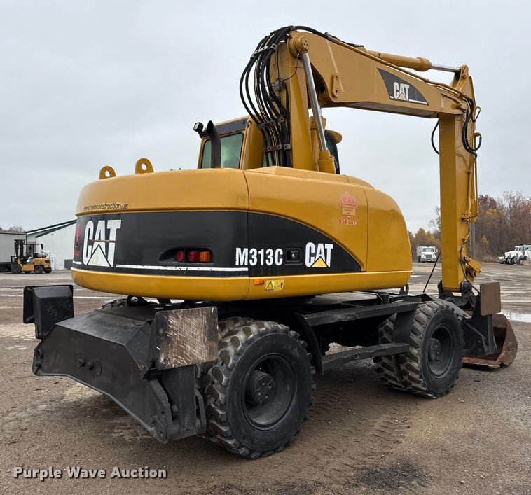 image for item DW7310 2005 Caterpillar M313C wheeled excavator
