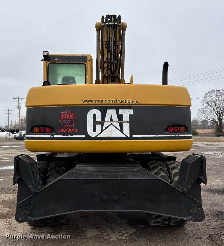 image for item DW7310 2005 Caterpillar M313C wheeled excavator