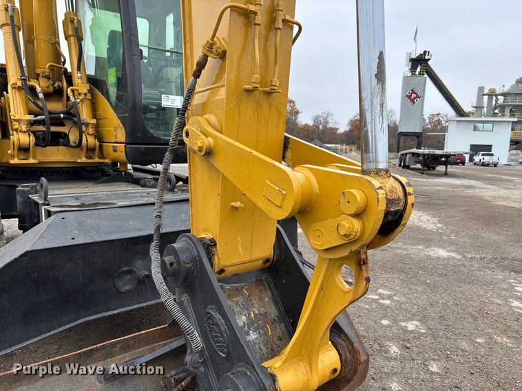 image for item DW7310 2005 Caterpillar M313C wheeled excavator