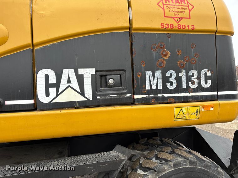 image for item DW7310 2005 Caterpillar M313C wheeled excavator