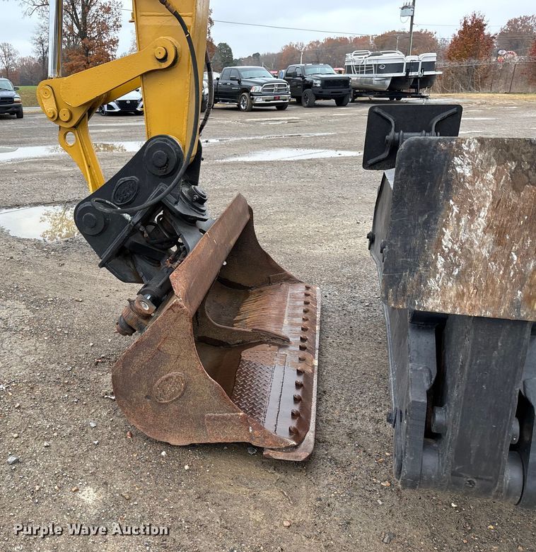 image for item DW7310 2005 Caterpillar M313C wheeled excavator