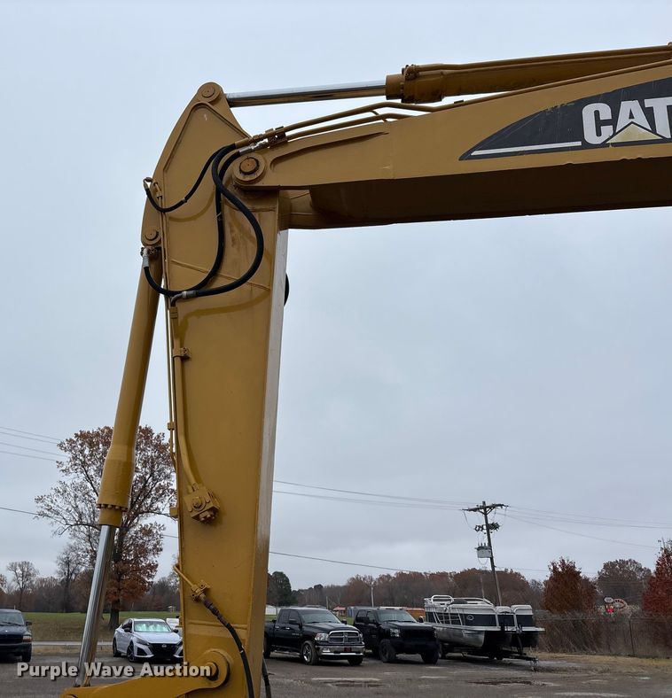 image for item DW7310 2005 Caterpillar M313C wheeled excavator