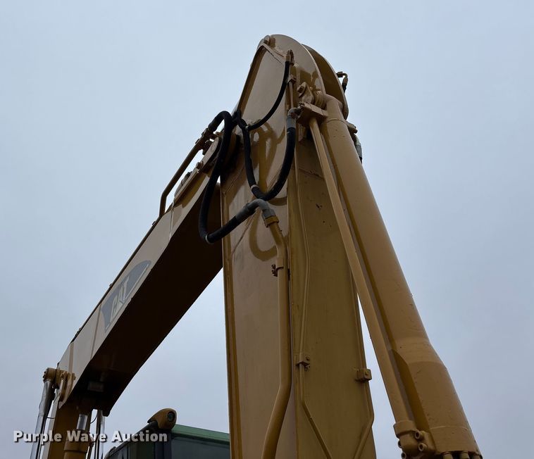 image for item DW7310 2005 Caterpillar M313C wheeled excavator