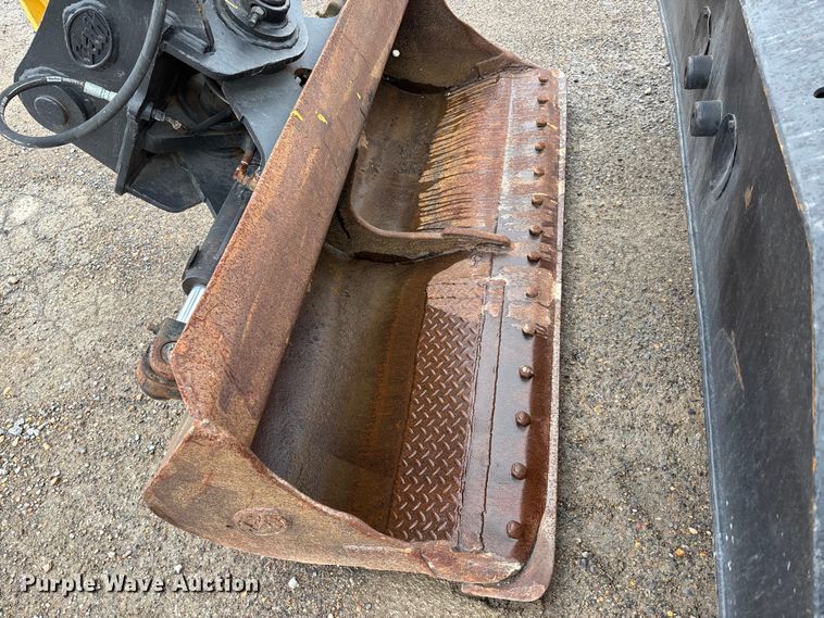 image for item DW7310 2005 Caterpillar M313C wheeled excavator