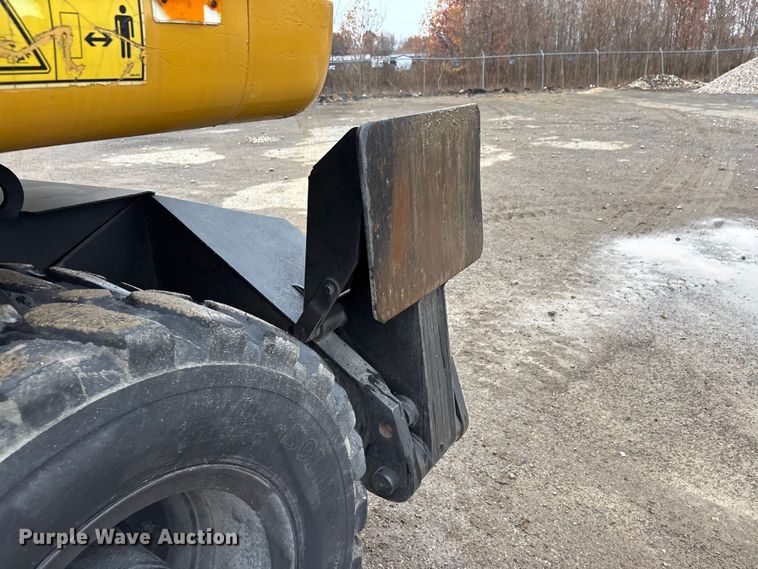 image for item DW7310 2005 Caterpillar M313C wheeled excavator