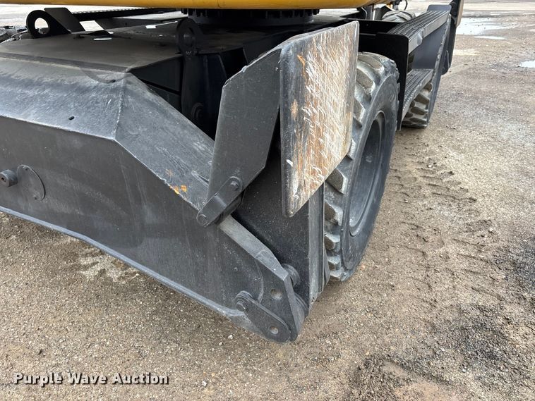 image for item DW7310 2005 Caterpillar M313C wheeled excavator