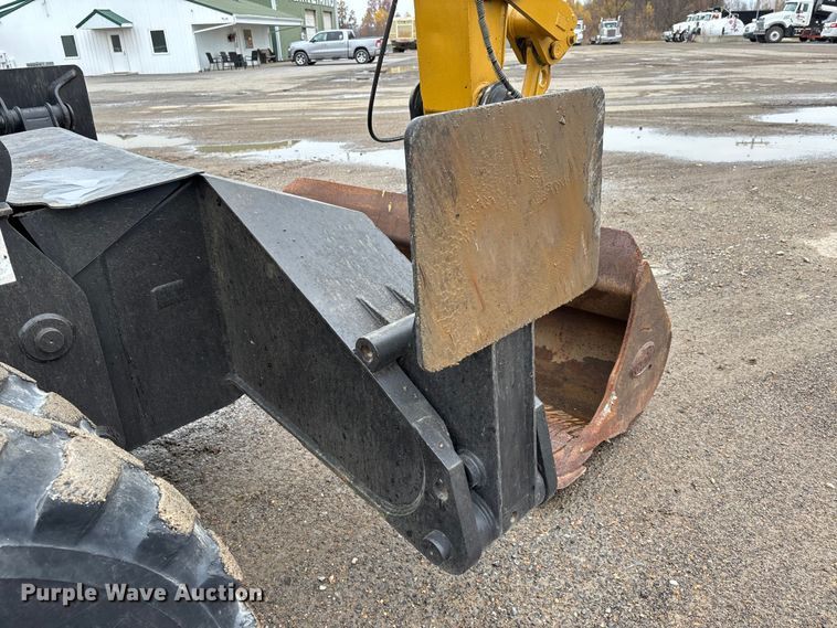 image for item DW7310 2005 Caterpillar M313C wheeled excavator