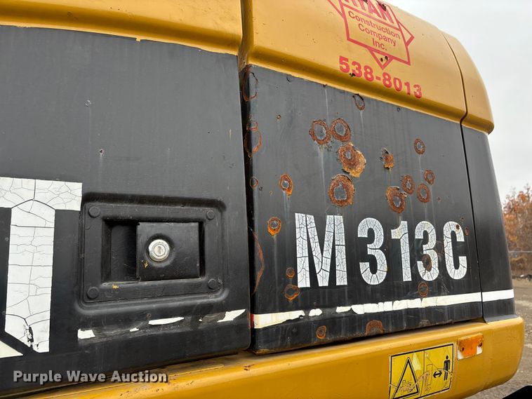 image for item DW7310 2005 Caterpillar M313C wheeled excavator