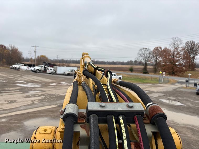 image for item DW7310 2005 Caterpillar M313C wheeled excavator