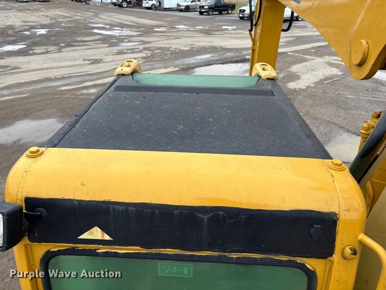 image for item DW7310 2005 Caterpillar M313C wheeled excavator