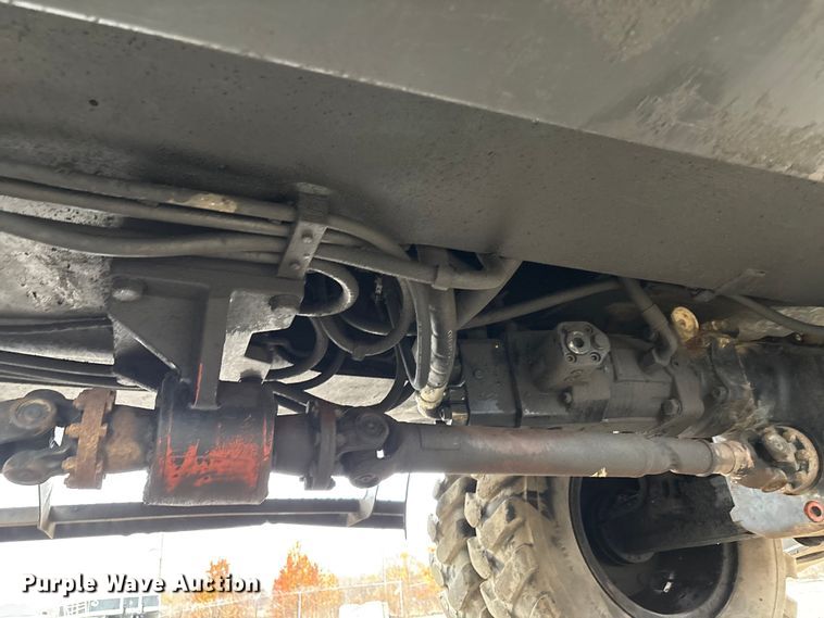 image for item DW7310 2005 Caterpillar M313C wheeled excavator