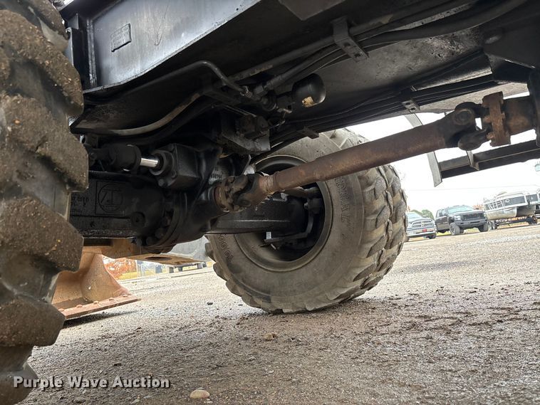 image for item DW7310 2005 Caterpillar M313C wheeled excavator