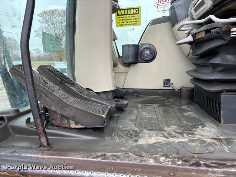 image for item DW7310 2005 Caterpillar M313C wheeled excavator