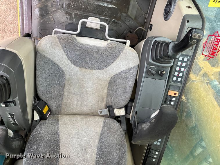 image for item DW7310 2005 Caterpillar M313C wheeled excavator