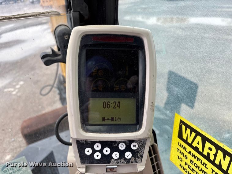 image for item DW7310 2005 Caterpillar M313C wheeled excavator