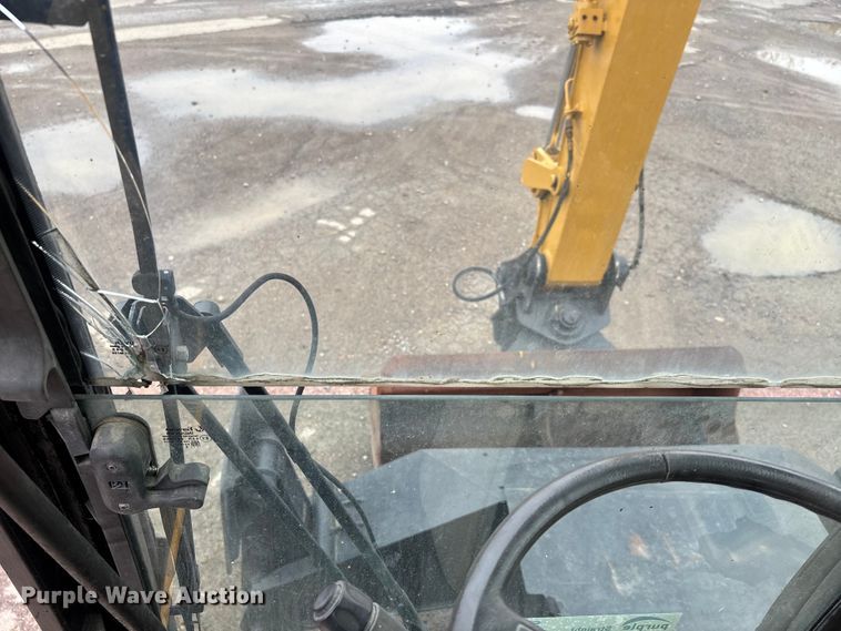 image for item DW7310 2005 Caterpillar M313C wheeled excavator