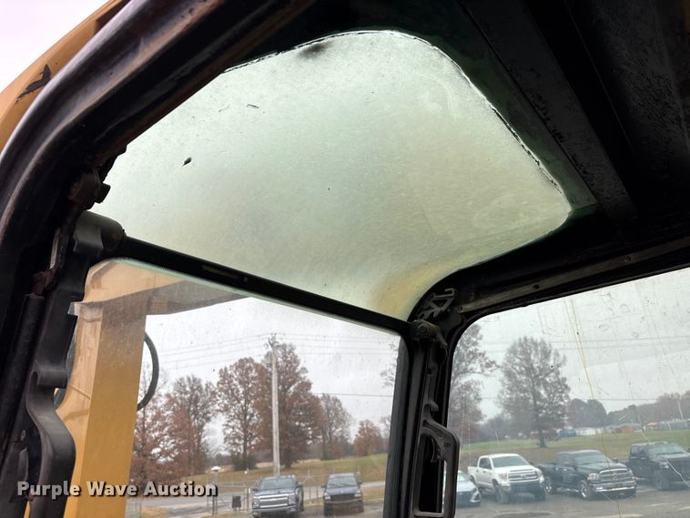 image for item DW7310 2005 Caterpillar M313C wheeled excavator