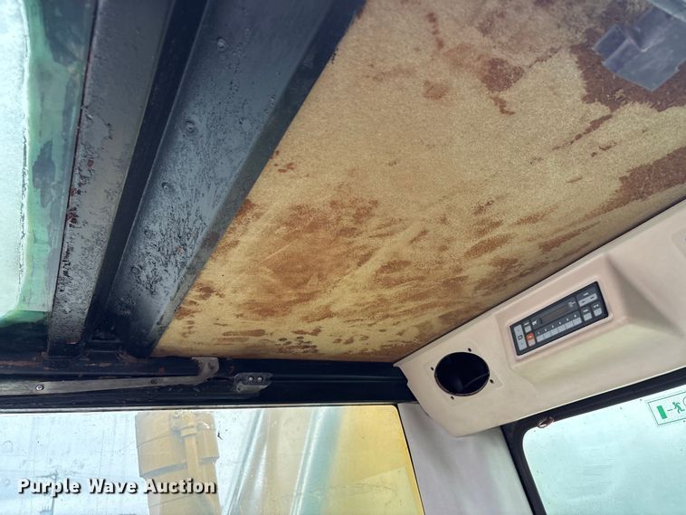 image for item DW7310 2005 Caterpillar M313C wheeled excavator