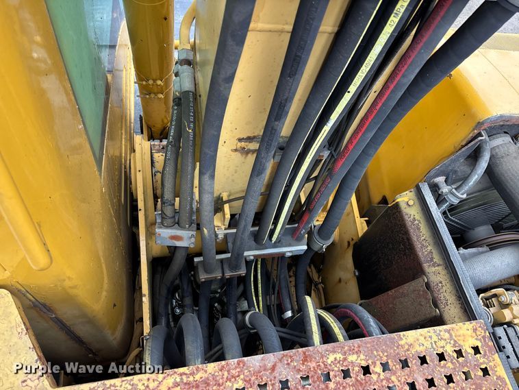 image for item DW7310 2005 Caterpillar M313C wheeled excavator