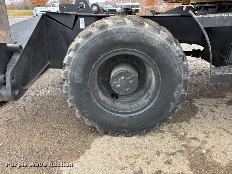 image for item DW7310 2005 Caterpillar M313C wheeled excavator