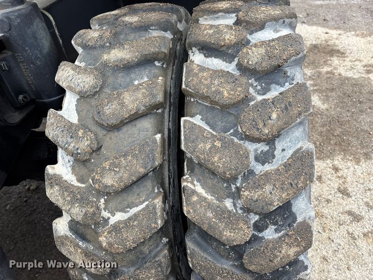 image for item DW7310 2005 Caterpillar M313C wheeled excavator