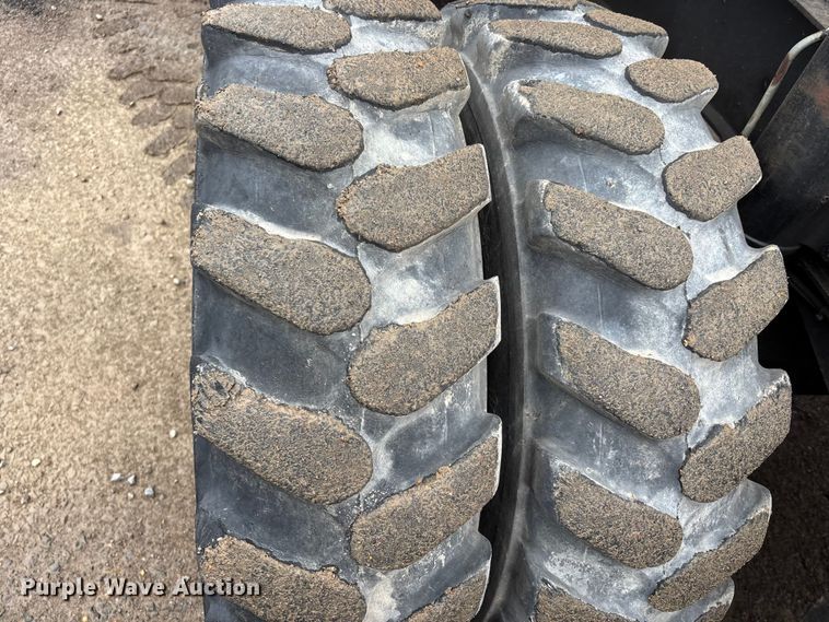 image for item DW7310 2005 Caterpillar M313C wheeled excavator