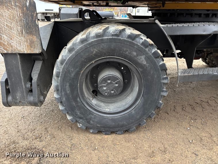 image for item DW7310 2005 Caterpillar M313C wheeled excavator