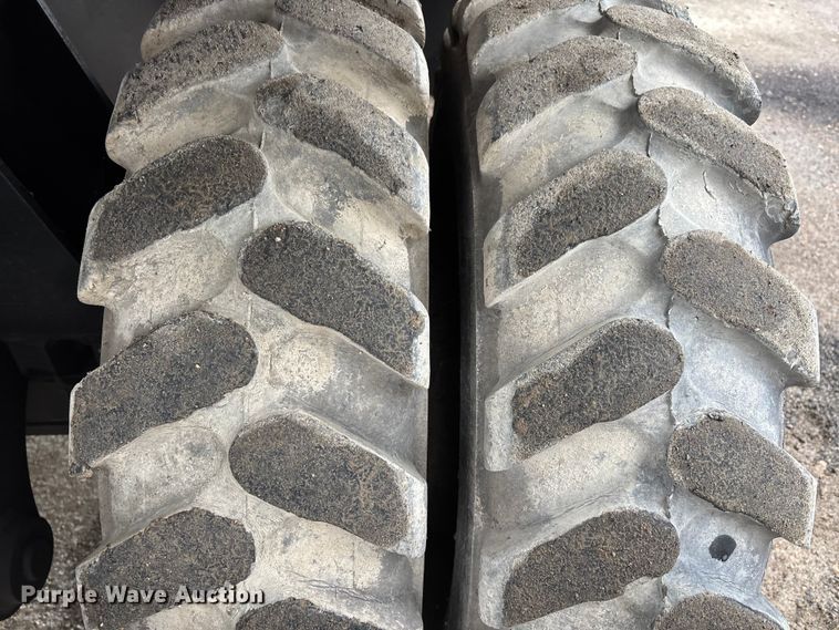 image for item DW7310 2005 Caterpillar M313C wheeled excavator