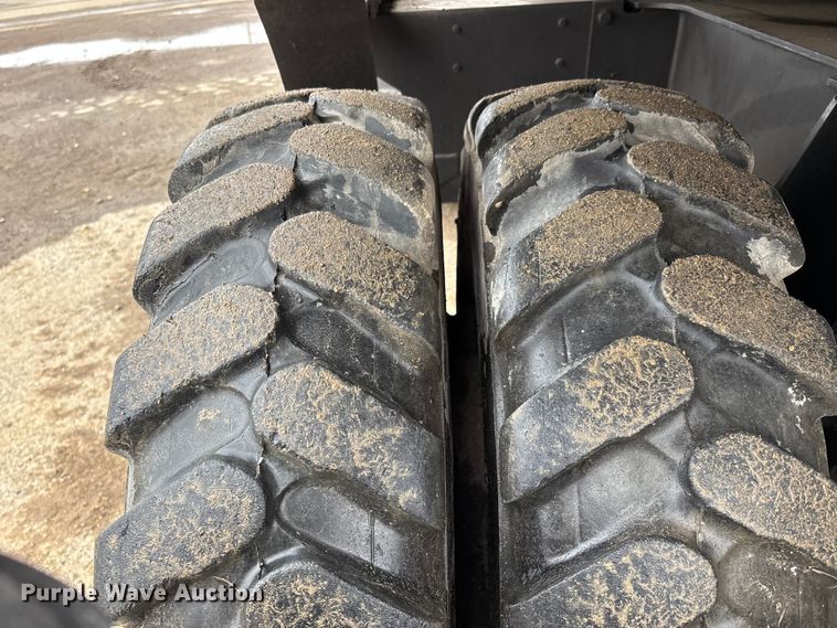 image for item DW7310 2005 Caterpillar M313C wheeled excavator