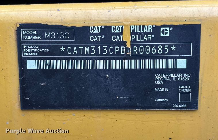 image for item DW7310 2005 Caterpillar M313C wheeled excavator