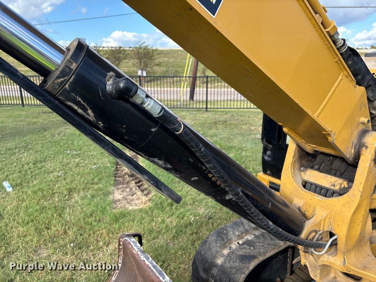 image for item EA7098 2021 Caterpillar 306 CR mini excavator