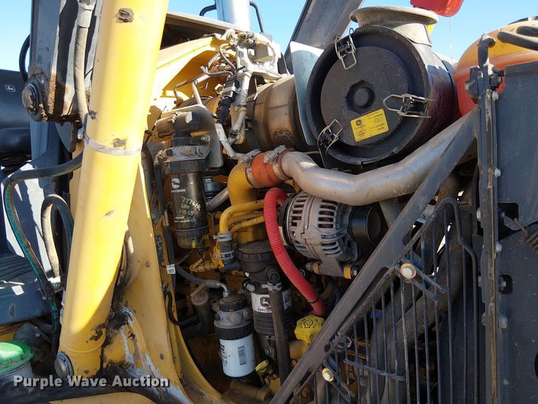 image for item EC1325 2014 John Deere 310SK backhoe