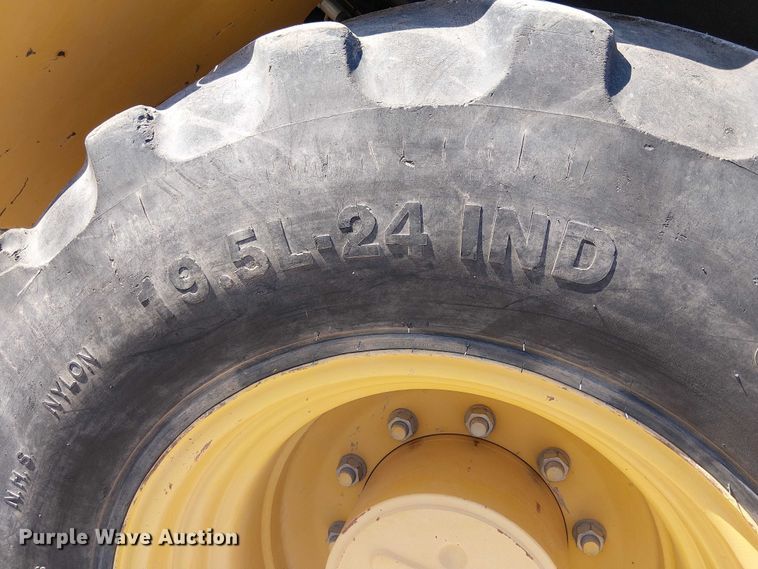 image for item EC1325 2014 John Deere 310SK backhoe