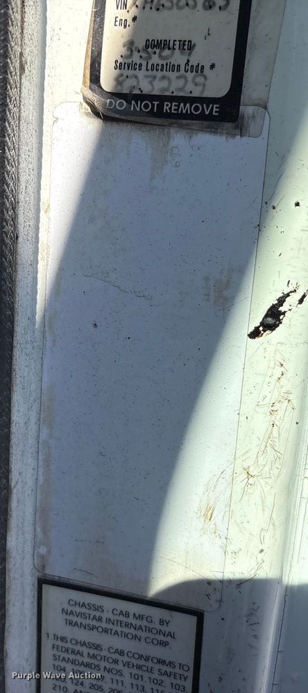 image for item EC4197 1999 International 4700 tack distributor truck