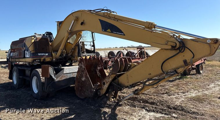 image for item EC4461 2002 Caterpillar M315 wheeled excavator