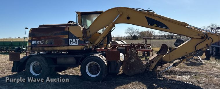image for item EC4461 2002 Caterpillar M315 wheeled excavator