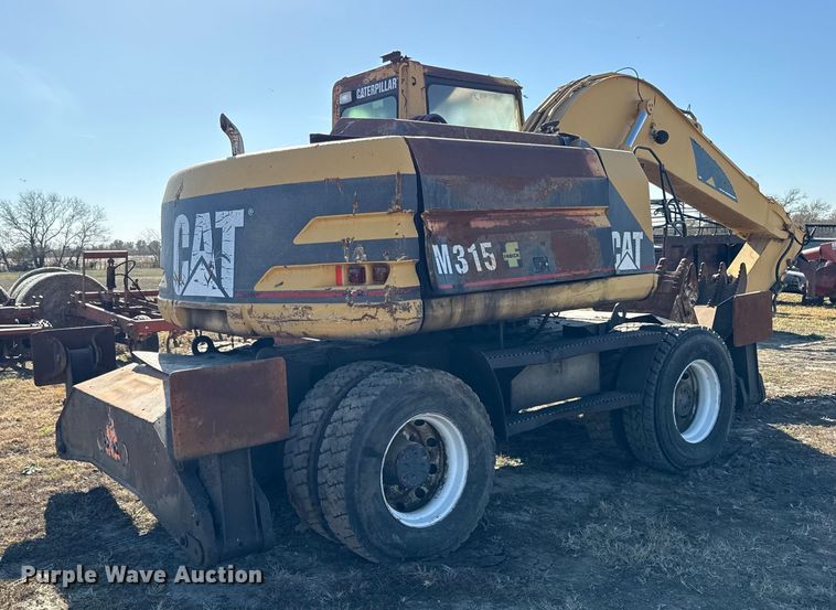 image for item EC4461 2002 Caterpillar M315 wheeled excavator