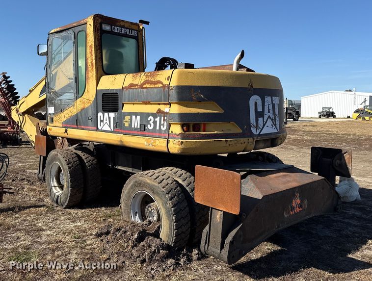 image for item EC4461 2002 Caterpillar M315 wheeled excavator