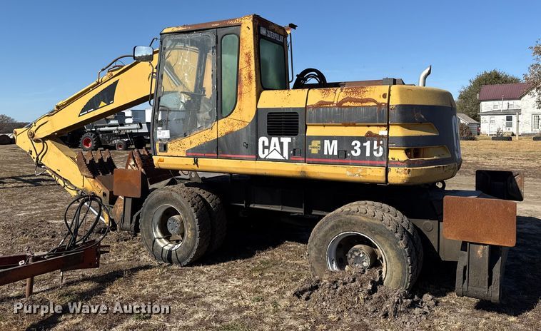 image for item EC4461 2002 Caterpillar M315 wheeled excavator