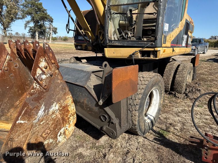 image for item EC4461 2002 Caterpillar M315 wheeled excavator