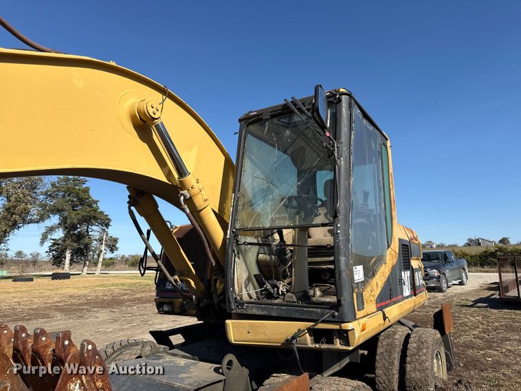 image for item EC4461 2002 Caterpillar M315 wheeled excavator