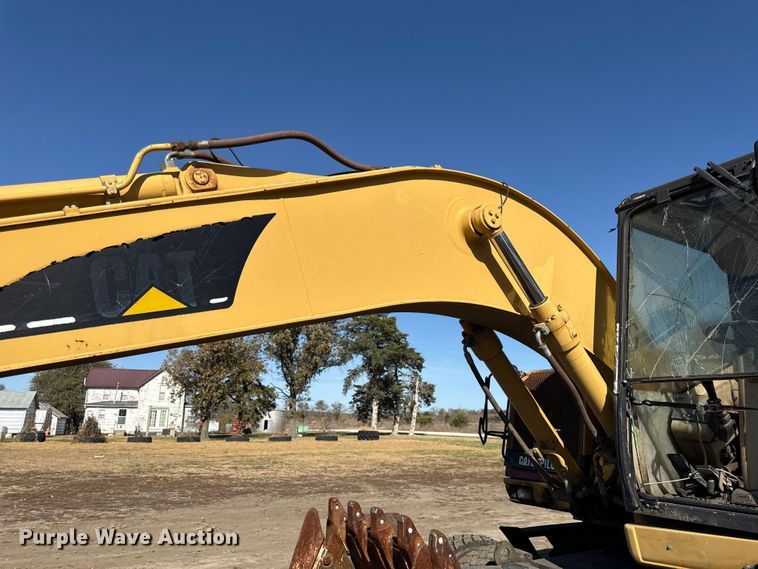 image for item EC4461 2002 Caterpillar M315 wheeled excavator