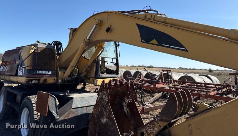 image for item EC4461 2002 Caterpillar M315 wheeled excavator