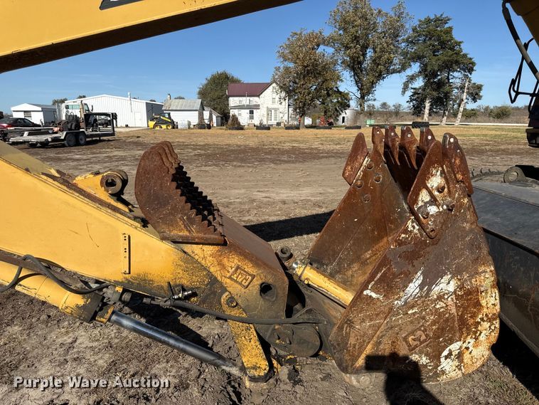 image for item EC4461 2002 Caterpillar M315 wheeled excavator