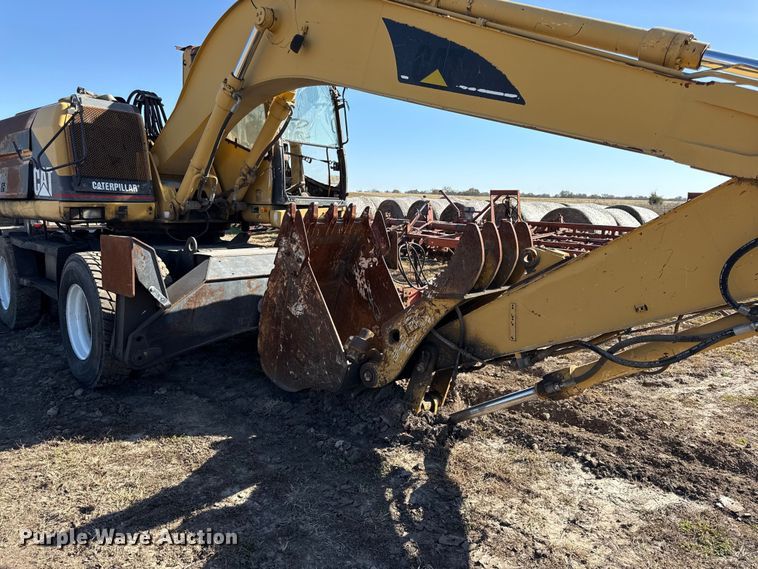 image for item EC4461 2002 Caterpillar M315 wheeled excavator