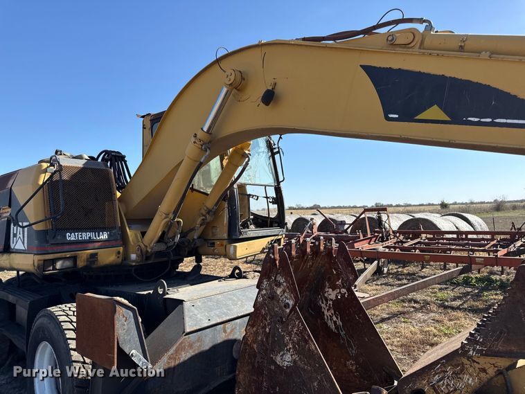 image for item EC4461 2002 Caterpillar M315 wheeled excavator