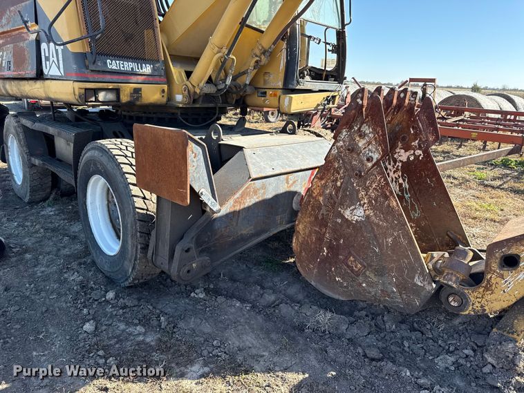 image for item EC4461 2002 Caterpillar M315 wheeled excavator