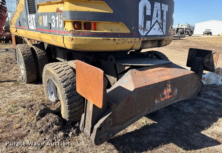 image for item EC4461 2002 Caterpillar M315 wheeled excavator