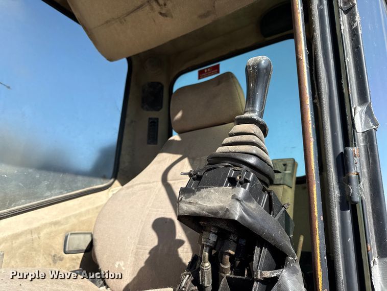 image for item EC4461 2002 Caterpillar M315 wheeled excavator